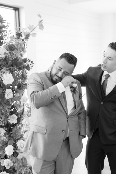 emotional groom at ceremony