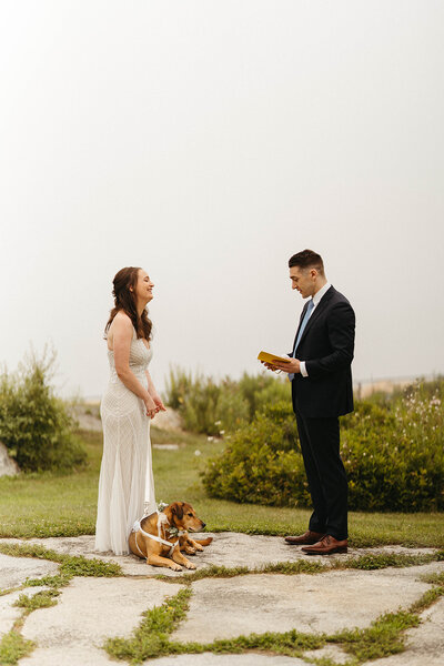 A couple saying their vows at Fort Williams Photographed by Hattie Mae Photography