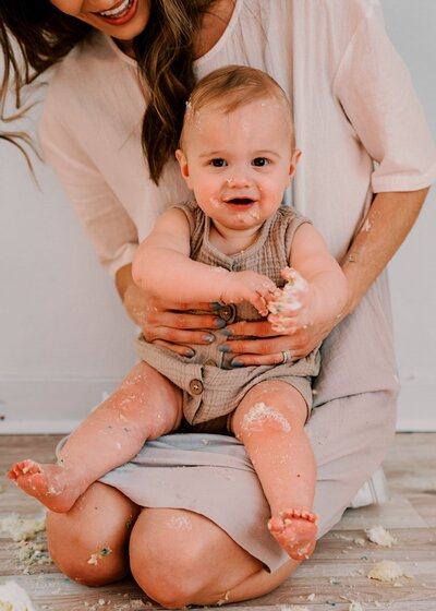toddler on mom's lap