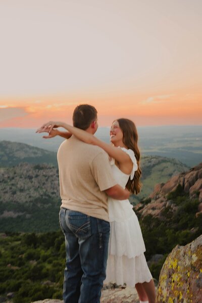 couple posing for engagement photos oklahoma city