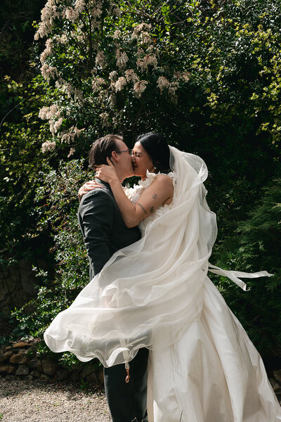 couple embracing at Melbourne wedding venue: Rippon Lea Estate