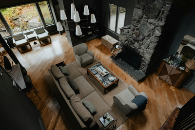 aerial view of living area with modern chandelier