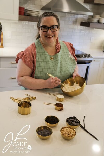 JL Cake designer mixing ingredients
