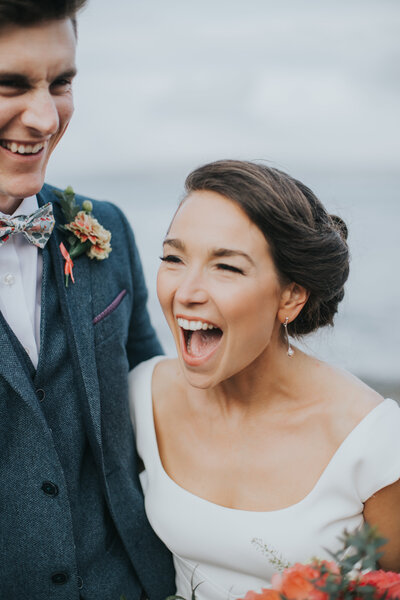 Devon Wedding Photographer laughing on her wedding day