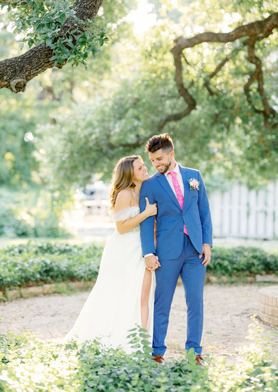bride and groom embracing
