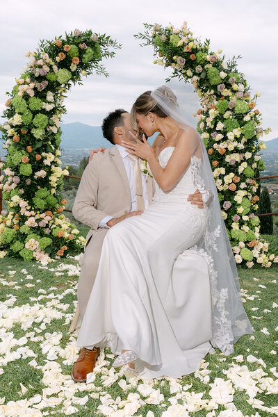 Bride and groom on wedding day in Tuscany