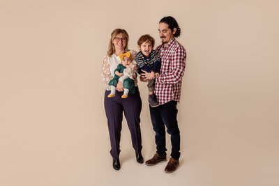 family of 4 studio portrait by Philadelphia Family Photographer