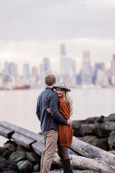 Alki Beach is one of 12 best spots for engagement photos in Seattle, overlooking the Seattle skyline, with water views and romantic vibes