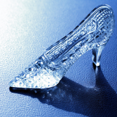 Glass slipper on blue background