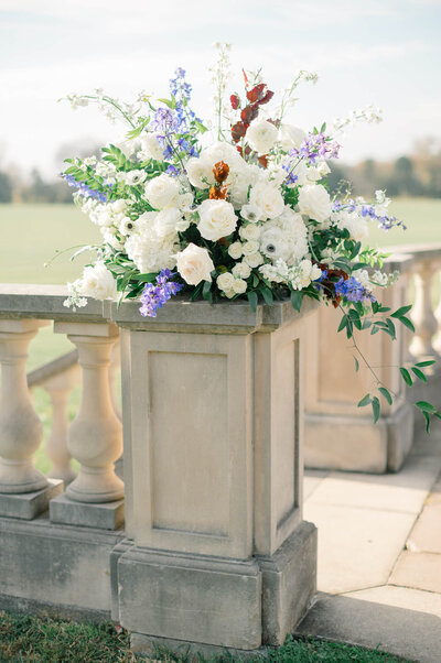 Gorgeous wedding florals at the ceremony space at Great Marsh Estate in Bealeton, Virginia.
