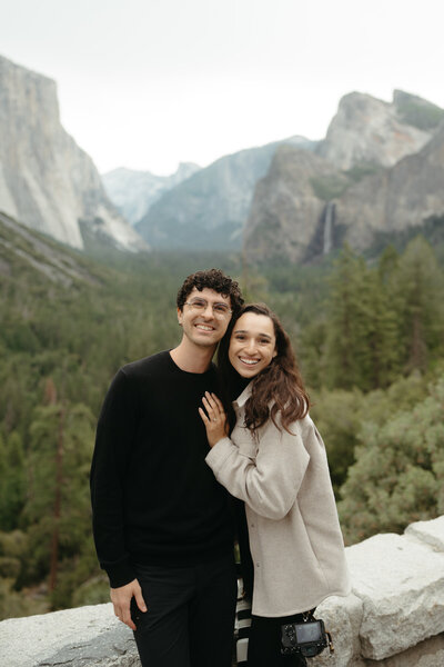 Glacier Point Wedding Photographers the Chaffins posing with their cameras in Yosemite