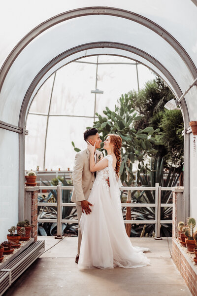 Bride + Groom Portrait in Greenhouse