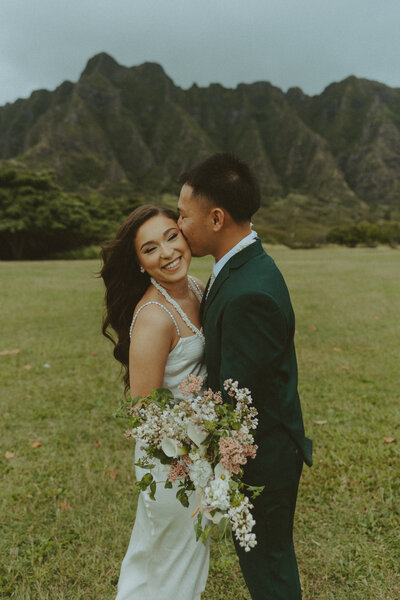 couple getting married at kualoa ranch in hawaii