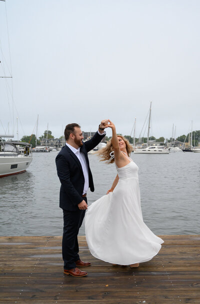 annapolis couple engaged dancing by the water