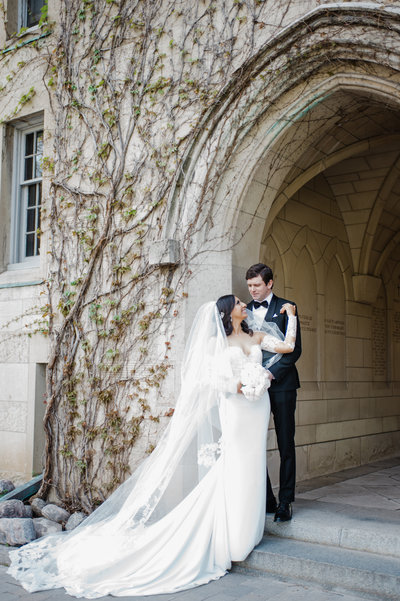 Bride and groom walk up memorial steps at their DC wedding