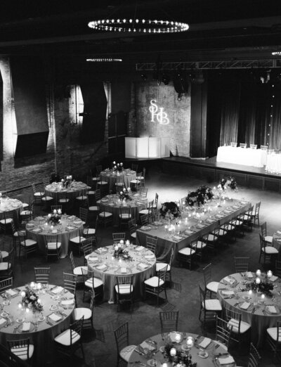 Black and white wedding reception space with tables at the Garden Theater, Detroit