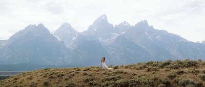 A bride and groom celebrating their marriage at their wedding in Jackson Hole, Wyoming