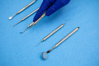 After dental surgery at Peak Prosthodontics in Lethbridge, avoid vigorous rinsing for 24 hours and using straws for 48 hours to prevent bleeding, and refrain from alcohol for several days to reduce bleeding risk and medication interference.