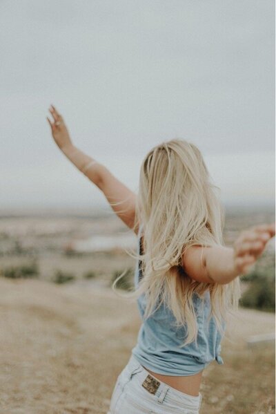 Happy young woman in nature