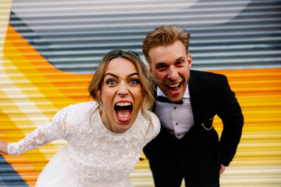 Fun Wedding Couple yelling at the camera