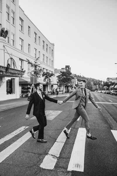 gay couple walking in downtown Ashland