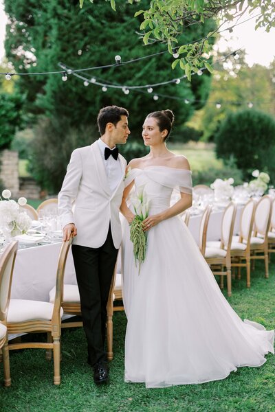 bride standing in the doorway in her bridal gown
