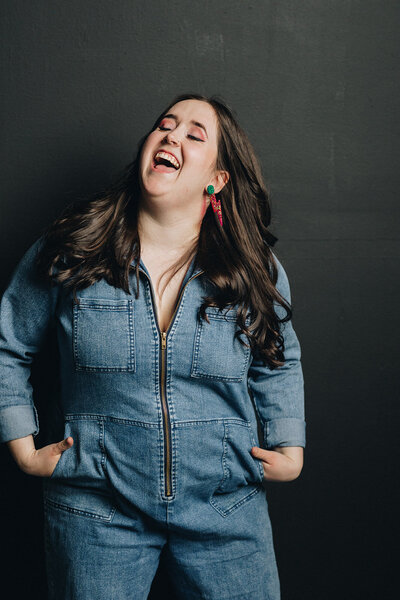 Lauren Roberts with two cameras at hip on turnagain arm