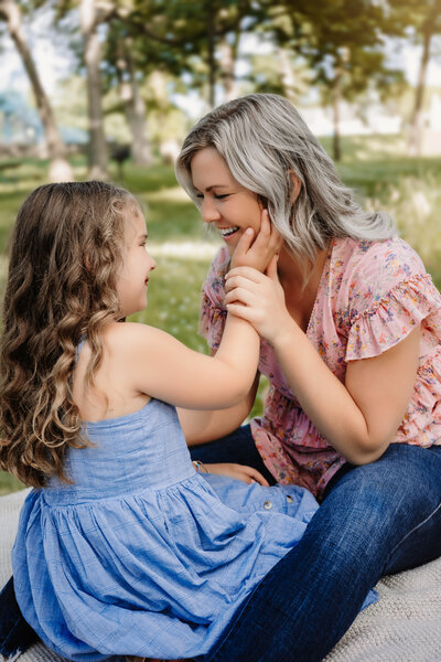 This mother and daughter combo pose during their spring mini session.