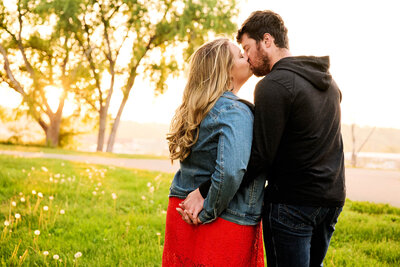 Couple kissing near river