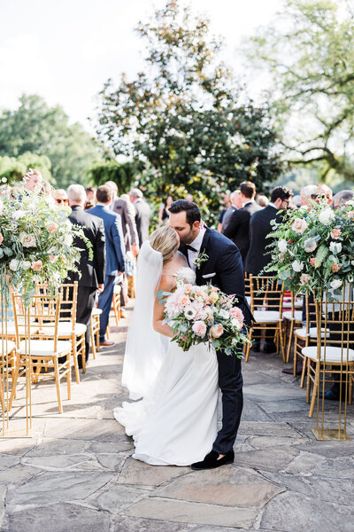 Bride and Groom Take Wedding Portraits at Grand Estate at Hidden Acres