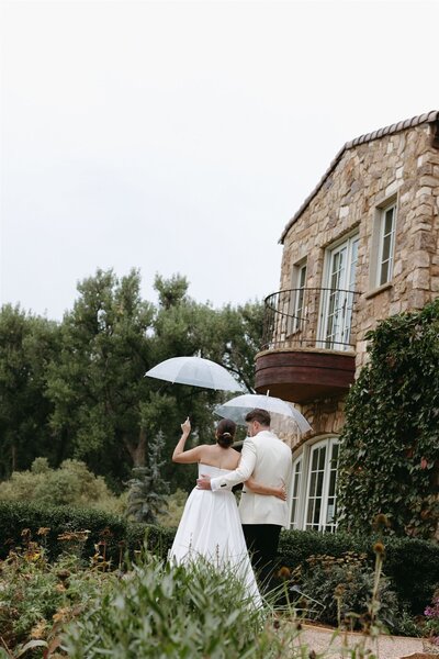 Wedding photos in front of Moss, Denver wedding venue