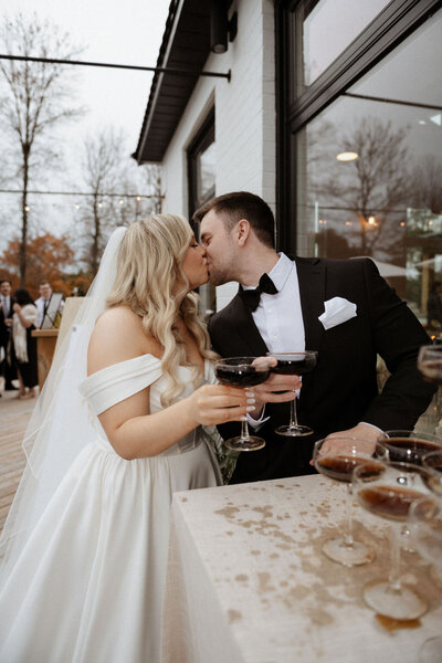 This intimate wedding reception at Cafe Palmier in Chelsea, Quebec, exudes Mid-Century Modern charm with a vibrant Palm Beach twist. Captured by Scott Wilson Photography, the event features retro-inspired decor, lush tropical accents, and a cozy, intimate atmosphere. The stylish couple and their guests enjoyed a unique blend of vintage elegance and relaxed sophistication. Keywords: Mid-Century Modern wedding, Palm Beach inspired wedding, intimate wedding reception, Cafe Palmier, Chelsea Quebec wedding, Scott Wilson Photography, retro wedding decor, tropical wedding accents.