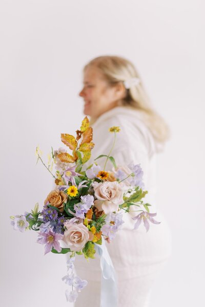 Cecile with a bridal bouquet