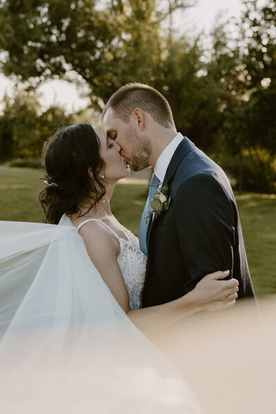 Washington wedding day bride and groom kissing