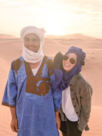 A traveler with a local in Morocco