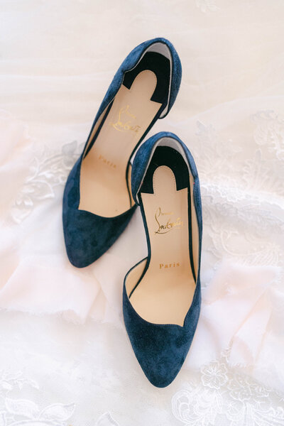 photo of Christian Louboutin blue suede shoes