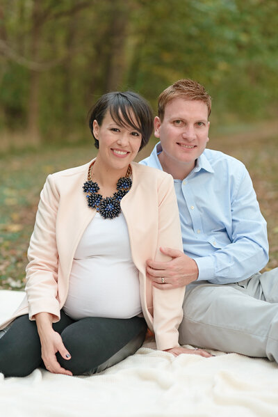 Fall Portraits for an Expectant Mom and Dad in the Fall. Photo taken by Lydia Teague Photography.