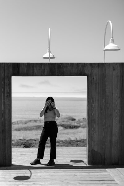 woman takes a photograph