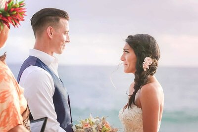 emotional bride and groom get married at White Rock Beach in Wailea, Maui