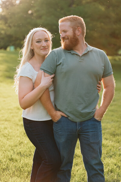 Summer engagement session photoshoot at Loose Park in Kansas City photographed by Emma Leigh Photo.