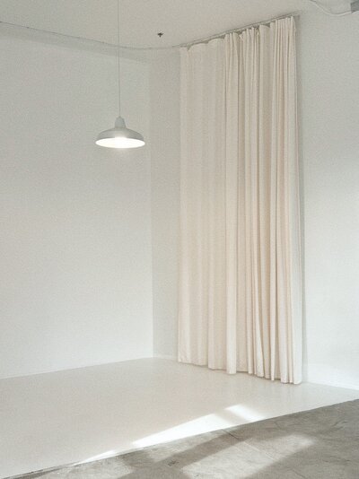 Photo wall with white curtains Light House Studio Albuquerque