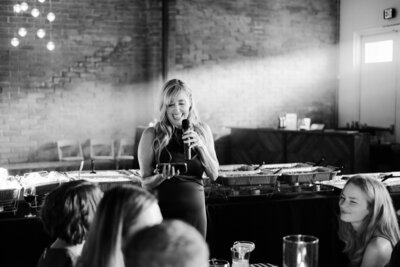 Mother of the bride reads her speech.
