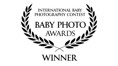 logo from the International Baby PHotography contest Baby Photo Awards Winner badge