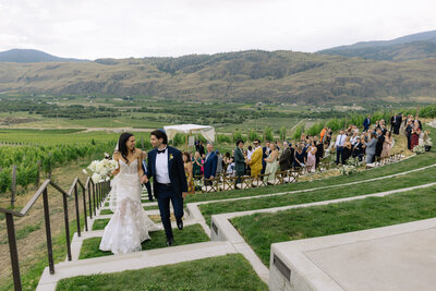 crush pad at 50th parallel estate winery setup for a lake view ceremony