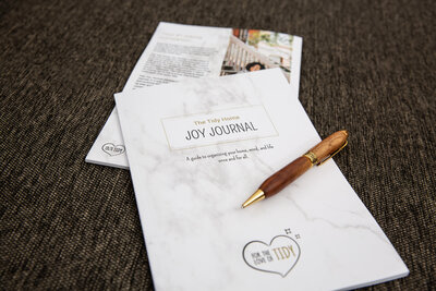 A copy of The Tidy Home Joy Journal