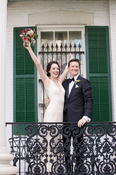 Bride and groom walk up memorial steps at their DC wedding