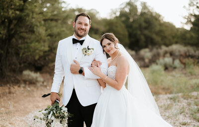 bride laying her head on groom's shoulders