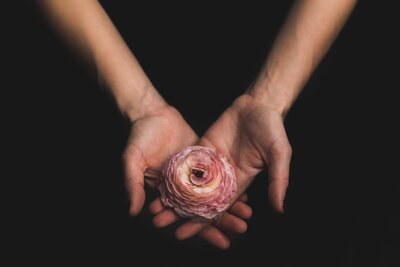 woman-holding-flower