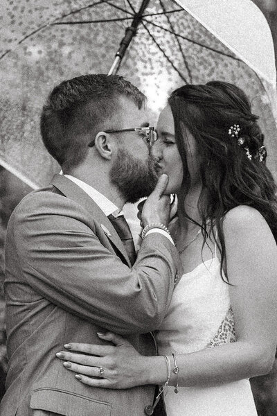 groom kisses bride after wedding ceremony in lancaster pa