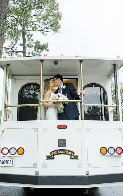 bride and groom kissing on wedding day